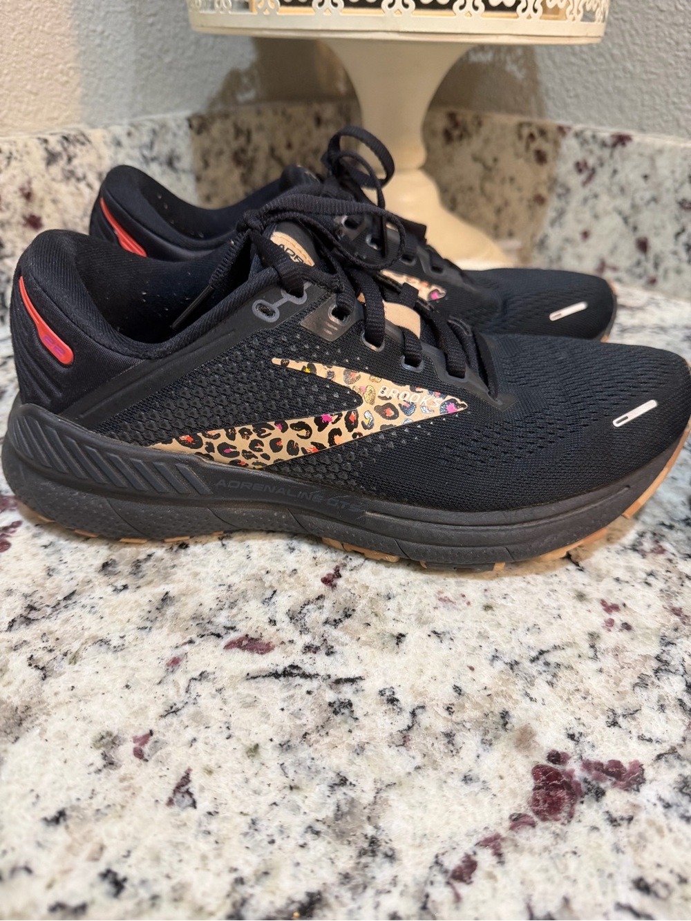 Brooks Women's Black Running Shoes with Leopard Accent and pink Detail